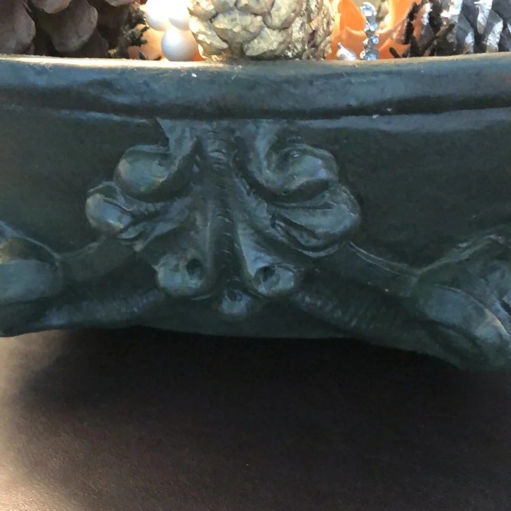 Floral, candle arrangement. Dark green, gold, silver. Votive vanilla candle